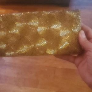 Gold clutch